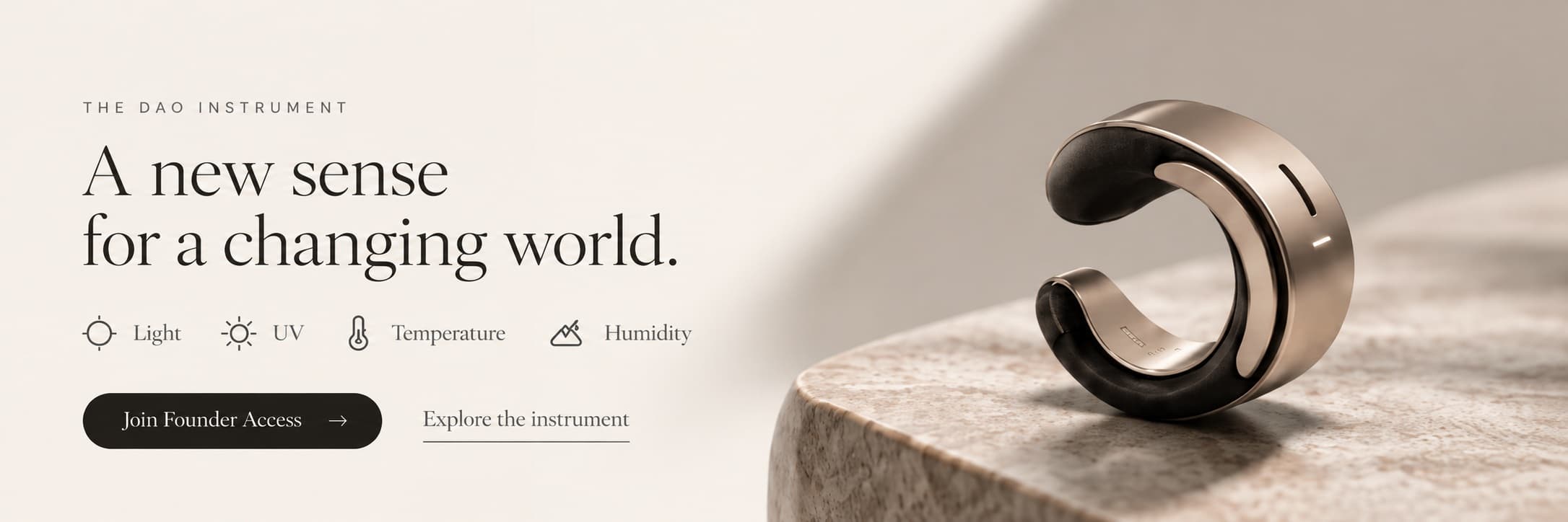 The Dao Instrument — “A new sense for a changing world.” An ear cuff on stone, with the four things it senses: light, UV, temperature and humidity.